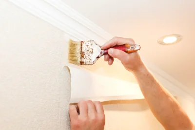 Pose de papier peint à Mouthe — revêtements muraux et toiles de verre